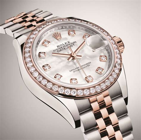 The white mother-of-pearl dials fake watches have diamond hour marks.