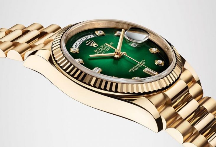 The 18ct gold fake watches have green dials.