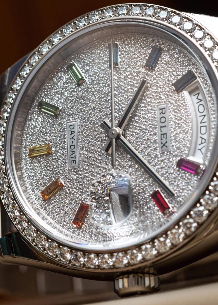 The 18k white gold fake watch is decorated with diamonds.